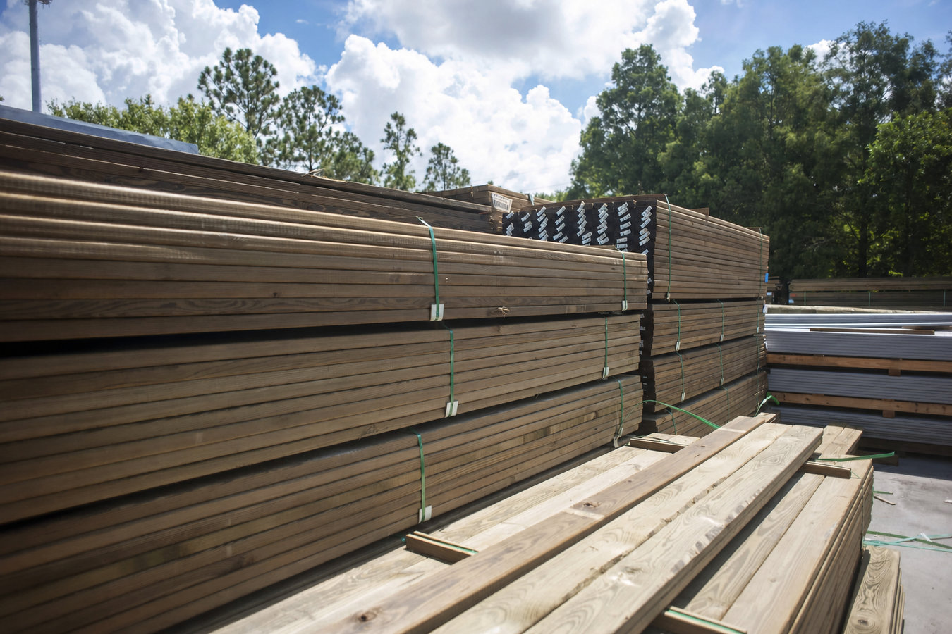 Pressure-treated wood deck construction
